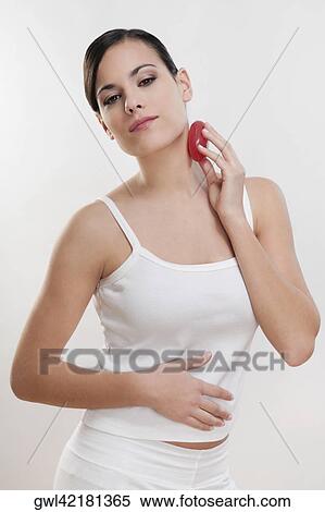 Woman applying soap on her neck View Large Photo Image Stock Photography - Woman applying soap on her neck. Fotosearch
