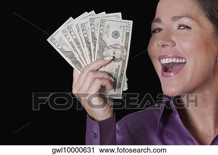 Woman holding currency notes View Large Photo Image Stock Image - Woman holding currency notes. Fotosearch