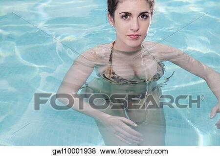 Woman in a swimming pool View Large Photo Image Stock Photo - Woman in a swimming pool. Fotosearch