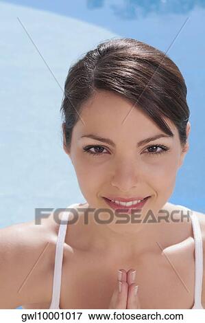 Woman practicing yoga and smiling View Large Photo Image Stock Photo - Woman practicing yoga and smiling. Fotosearch