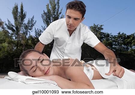 Woman receiving acupressure treatment View Large Photo Image Stock Image - Woman receiving acupressure treatment. Fotosearch