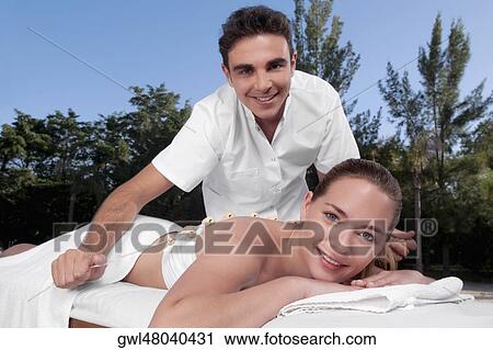 Woman receiving acupressure treatment View Large Photo Image Stock Image - Woman receiving acupressure treatment. Fotosearch