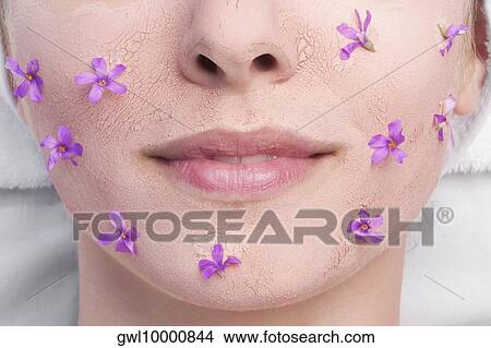 Woman receiving facial treatment View Large Photo Image Picture - Woman receiving facial treatment. Fotosearch