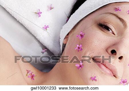 Woman receiving facial treatment View Large Photo Image Stock Image - Woman receiving facial treatment. Fotosearch