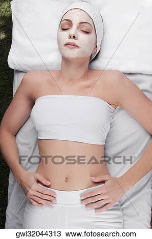 Woman receiving facial treatment View Large Photo Image Stock Image - Woman receiving facial treatment. Fotosearch