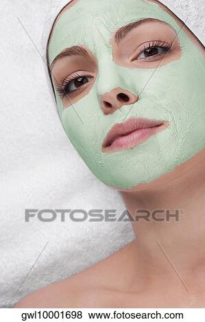 Woman receiving facial treatment View Large Photo Image Stock Photo - Woman receiving facial treatment. Fotosearch