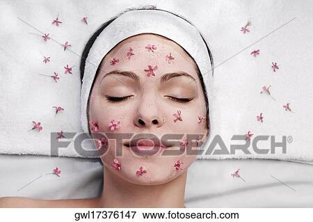 Woman receiving facial treatment View Large Photo Image Stock Photo - Woman receiving facial treatment. Fotosearch