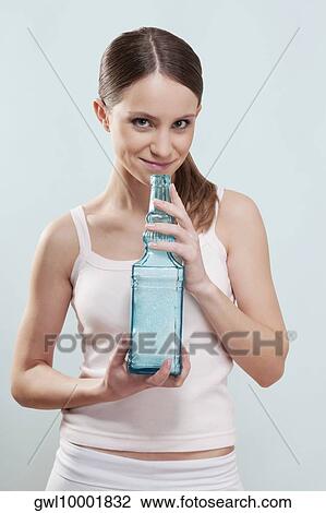 Woman smelling bath crystals View Large Photo Image Stock Image - Woman smelling bath crystals. Fotosearch