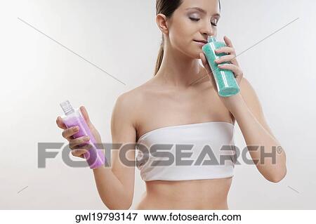 Woman smelling bath crystals View Large Photo Image Stock Photo - Woman smelling bath crystals. Fotosearch