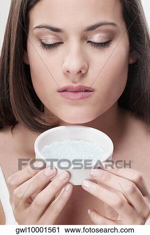 Woman smelling bath salt View Large Photo Image Stock Image - Woman smelling bath salt. Fotosearch
