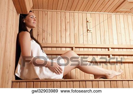 Woman taking a sauna bath View Large Photo Image Stock Photo - Woman taking a sauna bath. Fotosearch