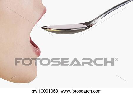 Woman taking medicine View Large Photo Image Stock Image - Woman taking medicine. Fotosearch