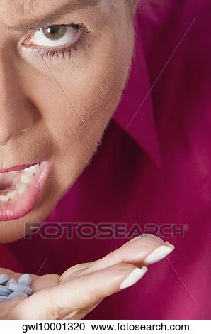 Woman taking medicine View Large Photo Image Stock Image - Woman taking medicine. Fotosearch
