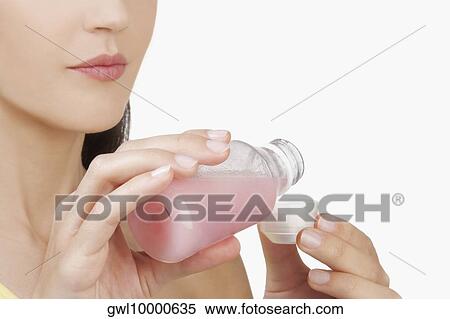 Woman taking medicine View Large Photo Image Stock Photography - Woman taking medicine. Fotosearch