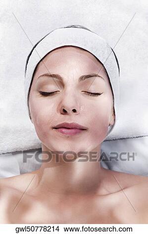 Woman with face pack on her face View Large Photo Image Picture - Woman with face pack on her face. Fotosearch