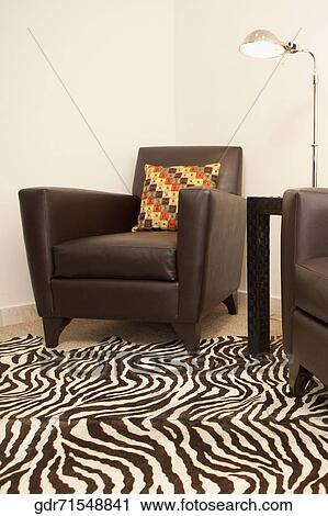 Armchair in the living room View Large Photo Image Stock Image - Armchair in the living room. Fotosearch