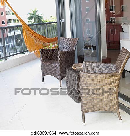 Armchairs at the balcony of a house View Large Photo Image Picture - Armchairs at the balcony of a house. Fotosearch