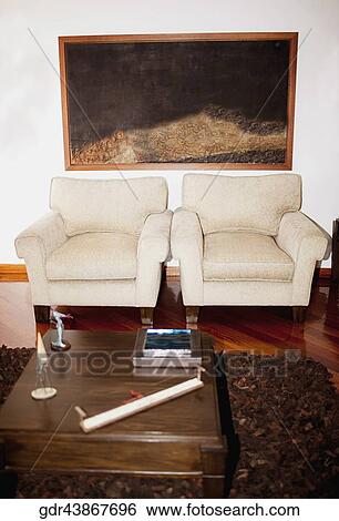 Armchairs in a living room View Large Photo Image Stock Photograph - Armchairs in a living room. Fotosearch