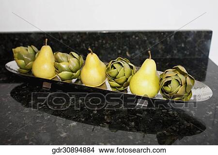 Artificial fruits on a tray on a table View Large Photo Image Picture - Artificial fruits on a tray on a table. Fotosearch