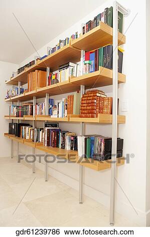 Bookshelf in the living room View Large Photo Image Stock Photograph - Bookshelf in the living room. Fotosearch