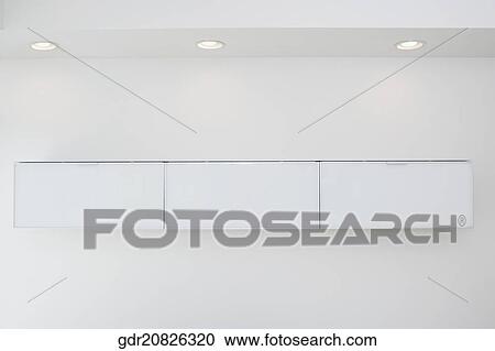 Cabinets on the wall of a living room View Large Photo Image Stock Image - Cabinets on the wall of a living room. Fotosearch