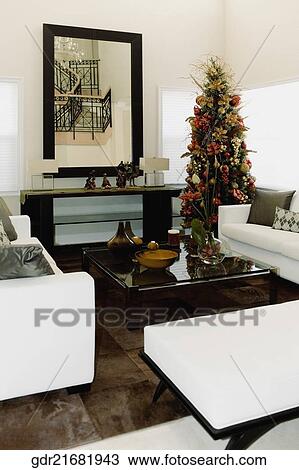 Christmas tree in a living room View Large Photo Image Stock Image - Christmas tree in a living room. Fotosearch