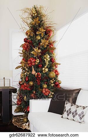 Christmas tree in a living room View Large Photo Image Stock Image - Christmas tree in a living room. Fotosearch
