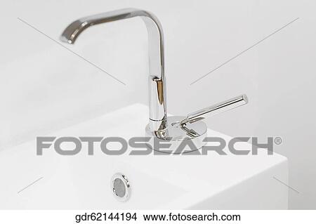 Picture - Close-up of a bathroom sink. Fotosearch