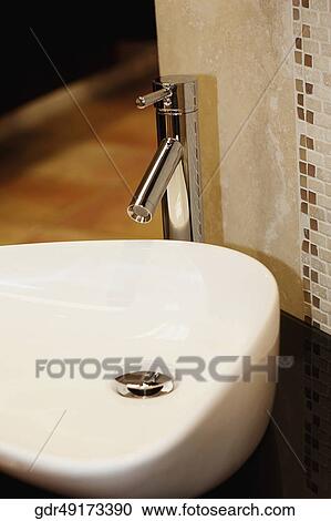 Close-up of a bathroom sink View Large Photo Image Stock Image - Close-up of a bathroom sink. Fotosearch