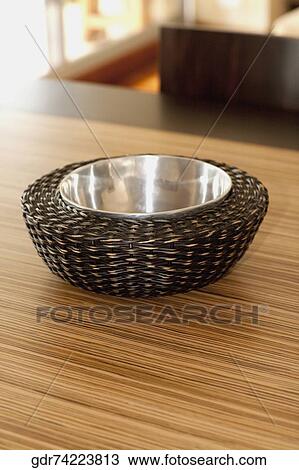 Close-up of a bowl on a dining table View Large Photo Image Stock Image - Close-up of a bowl on a dining table. Fotosearch