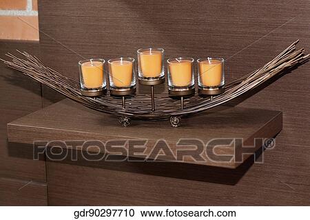 Close-up of a candlestick holder with candles View Large Photo Image Stock Image - Close-up of a candlestick holder with candles. Fotosearch