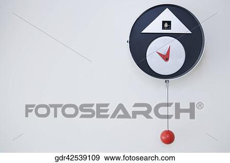 Close-up of a clock on the wall View Large Photo Image Stock Photo - Close-up of a clock on the wall. Fotosearch