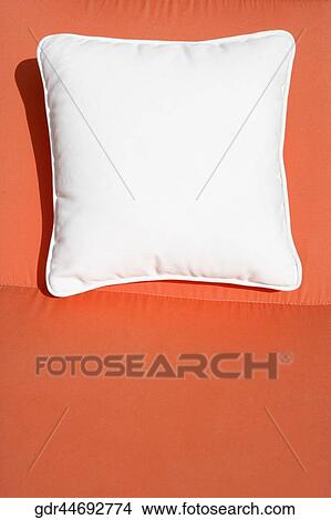 Picture - Close-up of a cushion on a lounge chair. Fotosearch