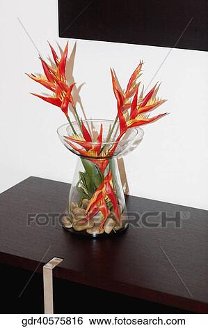 Stock Photograph - Close-up of a flower vase on a sideboard. Fotosearch