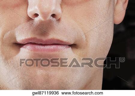 Close-up of a man View Large Photo Image Stock Photograph - Close-up of a man. Fotosearch