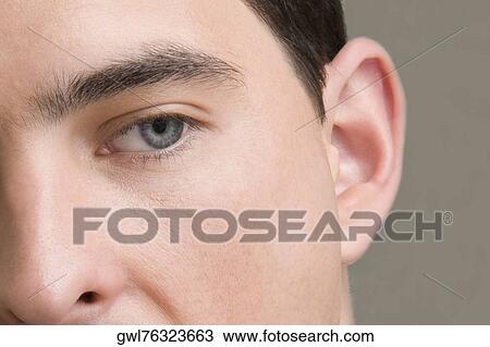 Close-up of a man's face View Large Photo Image Stock Image - Close-up of a man's face. Fotosearch
