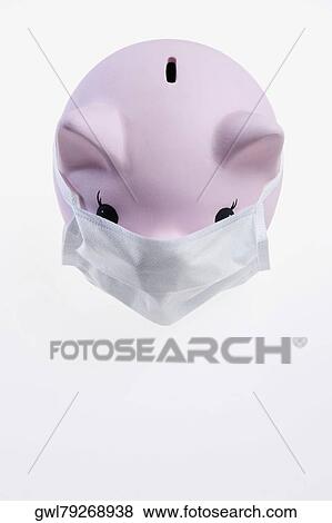 Close-up of a piggy bank wearing flu mask View Large Photo Image Stock Photo - Close-up of a piggy bank wearing flu mask. Fotosearch