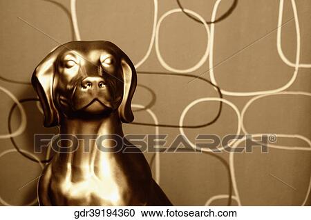 Stock Image - Close-up of a statue of dog. Fotosearch