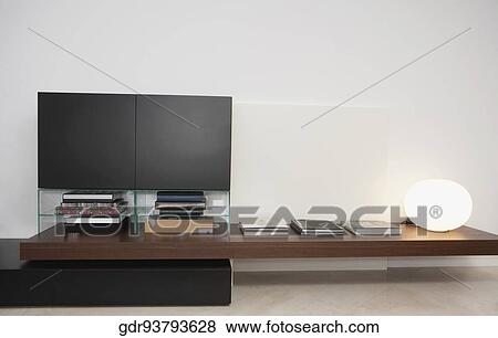 Stock Photo - Close-up of books on a sideboard. Fotosearch