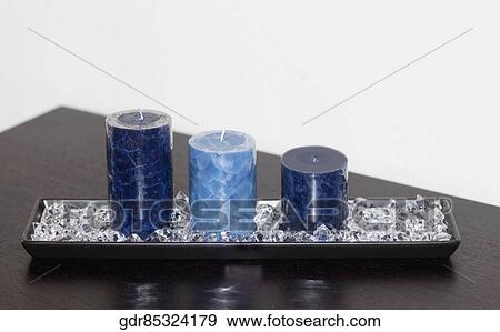 Close-up of candles on a tray View Large Photo Image Stock Photo - Close-up of candles on a tray. Fotosearch