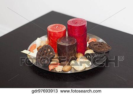 Close-up of candles with shells on a tray View Large Photo Image Stock Image - Close-up of candles with shells on a tray. Fotosearch