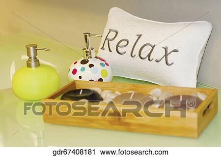 Close-up of candles with soap dispensers View Large Photo Image Stock Image - Close-up of candles with soap dispensers. Fotosearch