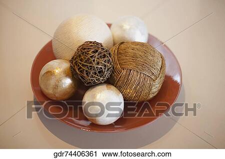Close-up of decorative balls on a tray View Large Photo Image Stock Image - Close-up of decorative balls on a tray. Fotosearch
