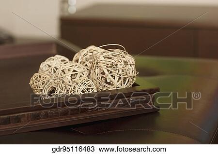 Close-up of decorative wicker balls on a table View Large Photo Image Stock Image - Close-up of decorative wicker balls on a table. Fotosearch