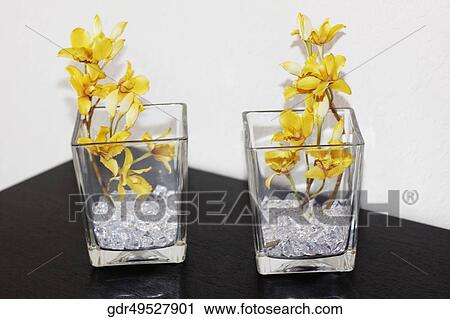 Close-up of flower vases on a table View Large Photo Image Stock Image - Close-up of flower vases on a table. Fotosearch