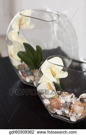 Close-up of flower vases on a table View Large Photo Image Stock Image - Close-up of flower vases on a table. Fotosearch
