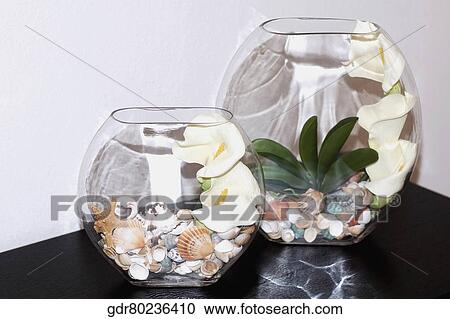 Close-up of flower vases on a table View Large Photo Image Stock Image - Close-up of flower vases on a table. Fotosearch