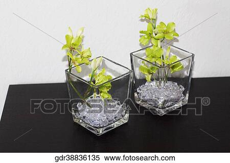 Close-up of flower vases on a table View Large Photo Image Stock Photography - Close-up of flower vases on a table. Fotosearch