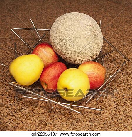 Close-up of fruits on a kitchen counter View Large Photo Image Stock Photo - Close-up of fruits on a kitchen counter. Fotosearch