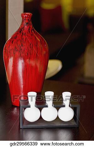 Close-up of showpieces on a sideboard View Large Photo Image Stock Photo - Close-up of showpieces on a sideboard. Fotosearch